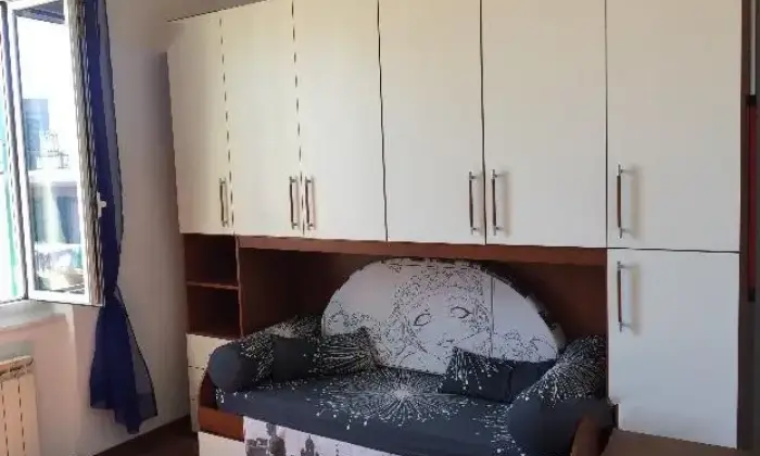 Rexer-Genova-Luminoso-trilocale-CAMERA-DA-LETTO