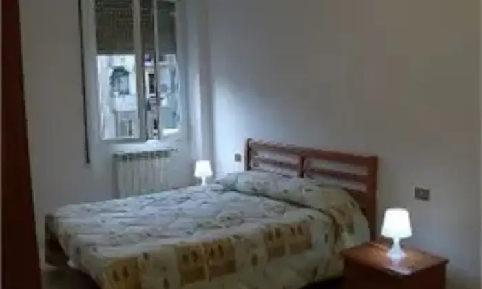 Rexer-Roma-Appartamento-per-vacanze-CAMERA-DA-LETTO