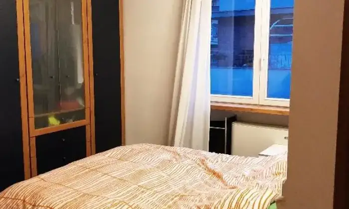 Rexer-Roma-Bilocale-arredato-CAMERA-DA-LETTO