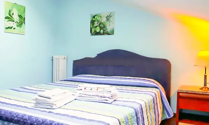 Rexer-Milano-Camera-Matrimoniale-camera-da-letto