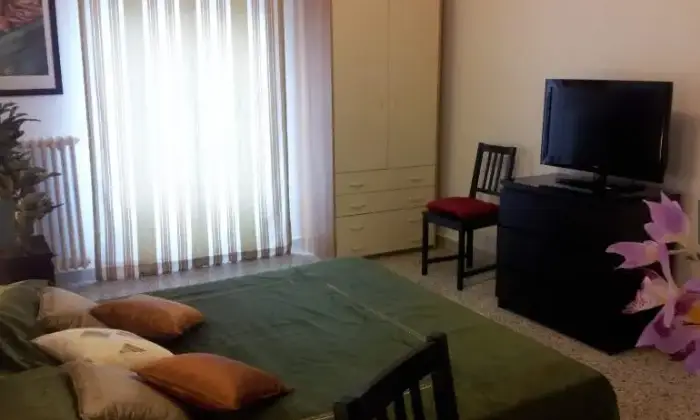 Rexer-Roma-Camere-uso-turistico-CAMERA-DA-LETTO