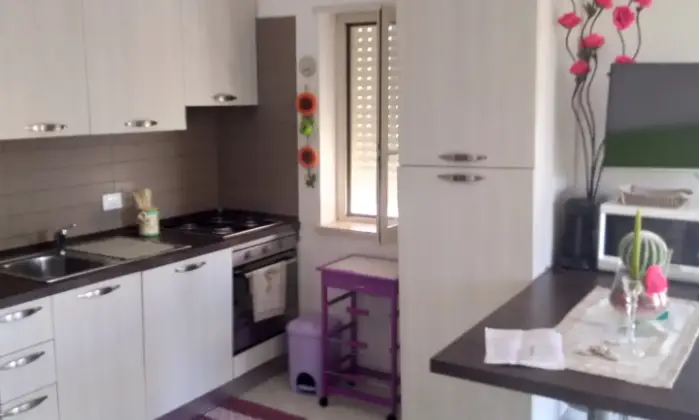 Rexer-Pizzo-Splendido-appartamento-F-con-due-camere-da-letto-PIZZO-BEACH-CLUB-PISCINEparco-giochi-CUCINA