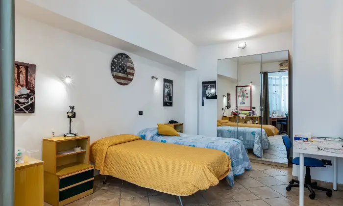Rexer-Catania-Luminoso-appartamento-al-piano-con-ascensore-e-CON-VISTA-MARE-CAMERA-DA-LETTO