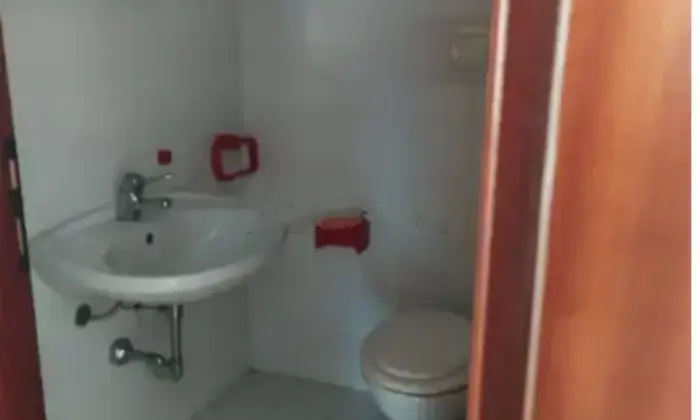 Rexer-Montereale-Valcellina-Casa-di-paese-in-piazza-Giulio-Cesare-a-Montereale-Valcellina-Bagno