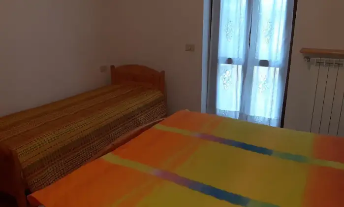 Rexer-Piazzatorre-Appartamento-in-Via-Santa-Lucia-Piazzatorre-CameraDaLetto