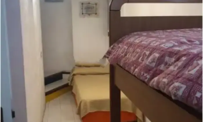 Rexer-Liscia-di-Vacca-Trilocale-in-vendita-in-via-Casi-Bianchi-ad-Arzachena-CameraDaLetto