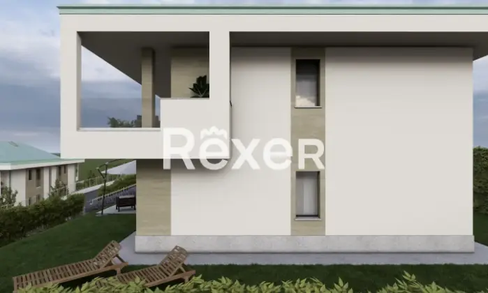 Rexer-CAPIAGO-INTIMIANO-Bilocale-con-terrazzo-Nuova-Costruzione-Giardino