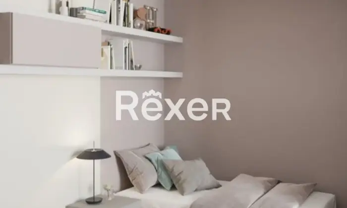 Rexer-SANREMO-Appartamento-tre-locali-con-ampi-balconi-CameraDaLetto
