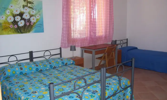 Rexer-Vittoria-Villa-con-grande-appartamento-climatizzato-CameraDaLetto