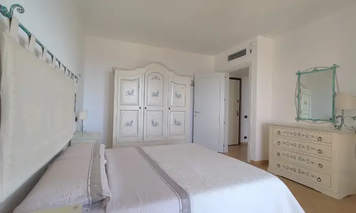 Rexer-Iglesias-Elegante-appartamento-con-spendita-vista-mare-CameraDaLetto