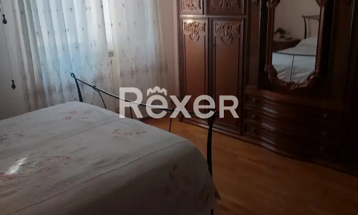 Rexer-Montepulciano-Appartamento-al-piano-terra-con-giardino-privato-box-e-cantina-a-SantAlbino-di-Montepulciano-Camera-da-letto