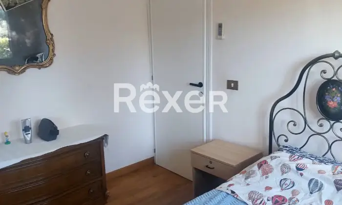 Rexer-Montepulciano-Appartamento-al-piano-terra-con-giardino-privato-box-e-cantina-a-SantAlbino-di-Montepulciano-Camera