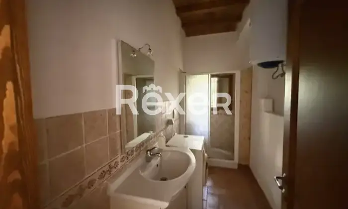 Rexer-Vinci-Casa-rustica-immersa-nel-bosco-su-due-livelli-Altro