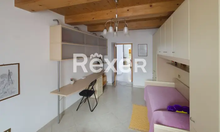 Rexer-Villagrande-Trilocale-con-box-auto-in-edificio-storico-ristrutturato-Camera-da-letto-matrimoniale