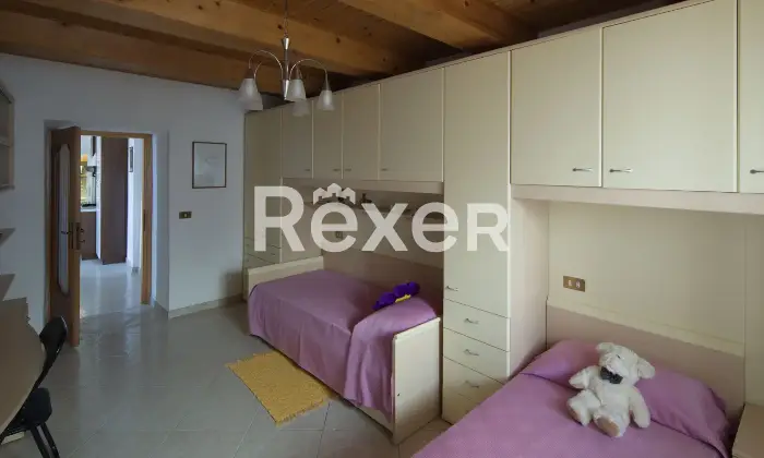 Rexer-Villagrande-Trilocale-con-box-auto-in-edificio-storico-ristrutturato-Camera-da-letto-matrimoniale