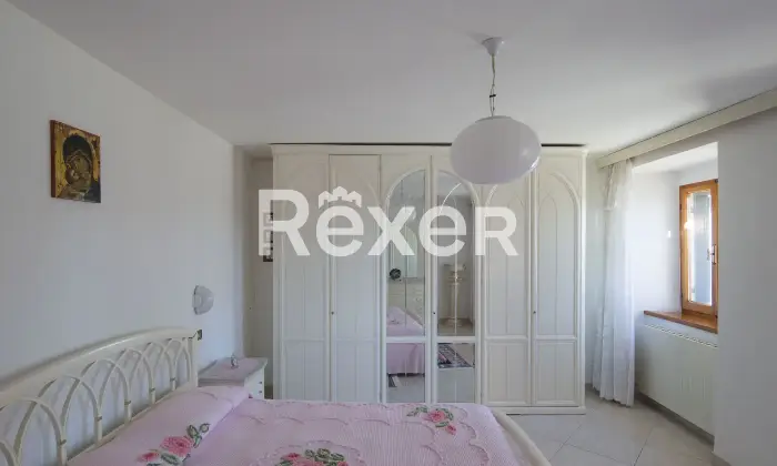Rexer-Villagrande-Trilocale-con-box-auto-in-edificio-storico-ristrutturato-Camera-da-letto-matrimoniale