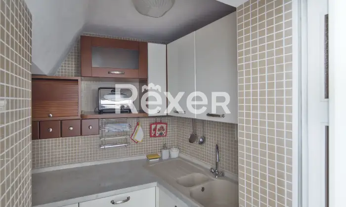 Rexer-Villagrande-Trilocale-con-box-auto-in-edificio-storico-ristrutturato-Cucina