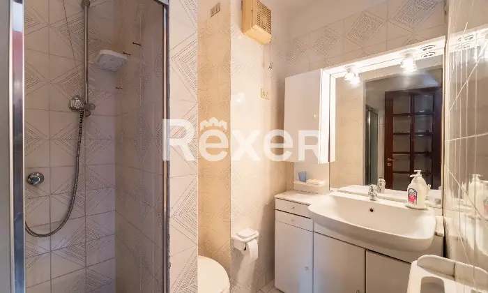Rexer-Rho-Villetta-a-schiera-con-box-Altro