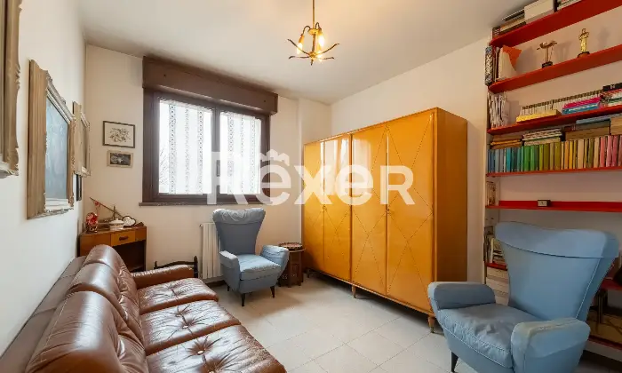 Rexer-Milano-Luminoso-quadrilocale-con-terrazzino-cantina-e-box-auto-Camera