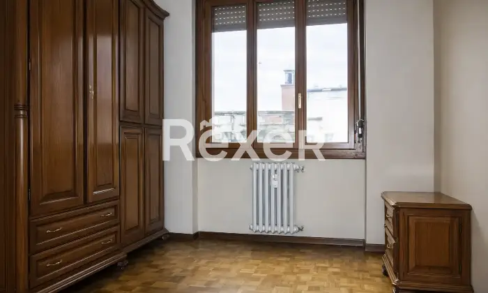 Rexer-Ossona-Ampio-trilocale-con-ascensore-e-box-auto-Altro