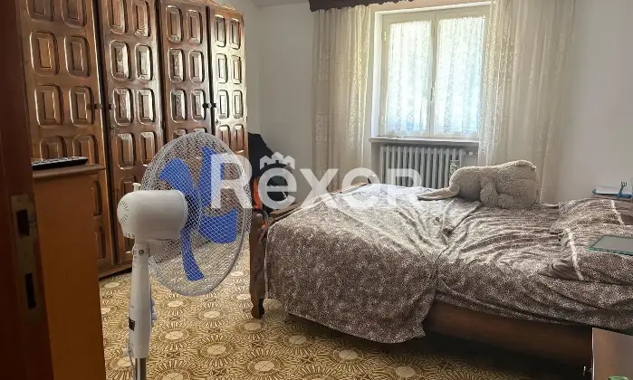 Rexer-Tagliacozzo-Spazioso-appartamento-CameraDaLetto