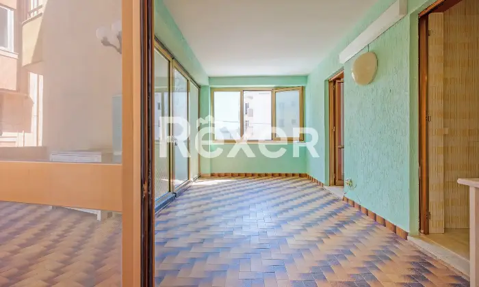 Rexer-Gallipoli-Appartamento-al-primo-piano-con-veranda-e-terrazzo-abitabile-con-scorci-vista-mare-Veranda