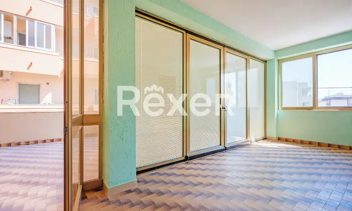 Rexer-Gallipoli-Appartamento-al-primo-piano-con-veranda-e-terrazzo-abitabile-con-scorci-vista-mare-Veranda