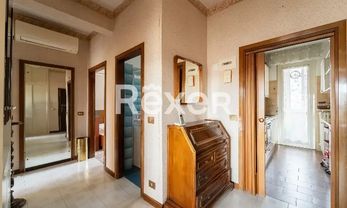 Rexer-Milano-Tre-locali-al-piano-alto-Altro