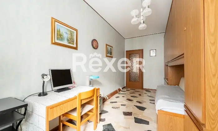 Rexer-Milano-Trilocale-con-doppi-balconi-e-cantina-Camera-da-letto