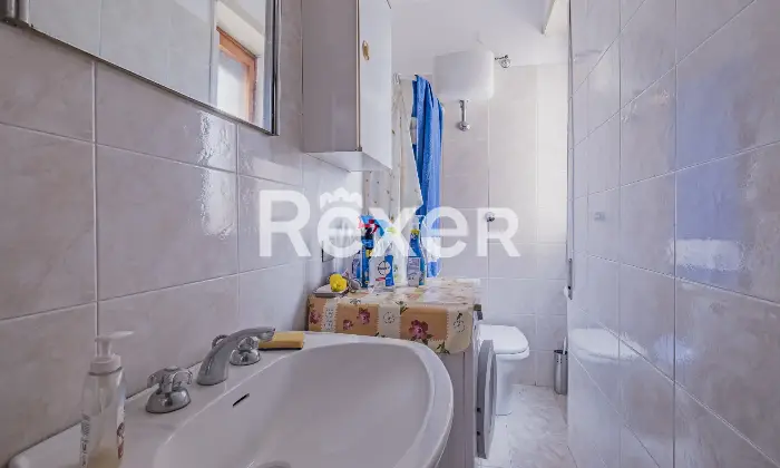 Rexer-Roma-Talenti-in-comprensorio-elegante-immerso-nel-verde-Altro
