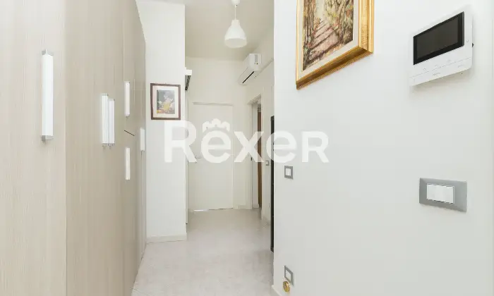 Rexer-Busnago-ULTIMO-PIANO-Trilocale-con-cucina-a-vista-Altro