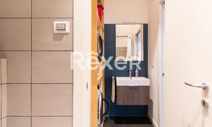 Rexer-Milano-Trilocale-ristrutturato-con-doppio-servizi-due-balconi-e-cantina-Altro