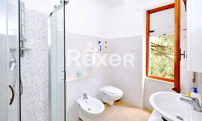 Rexer-Cala-Gonone-Appartamento-con-terrazza-a-livello-e-box-auto-Altro