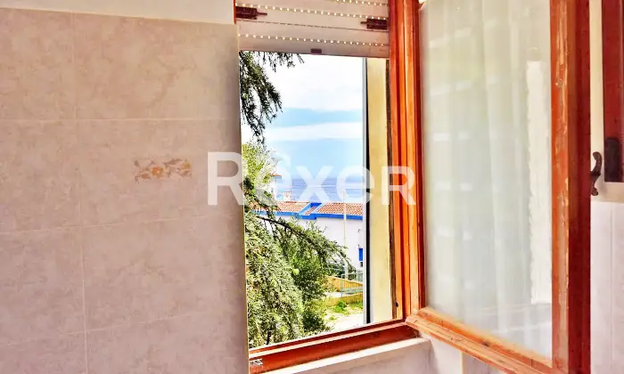 Rexer-Cala-Gonone-Appartamento-con-terrazza-a-livello-e-box-auto-Altro