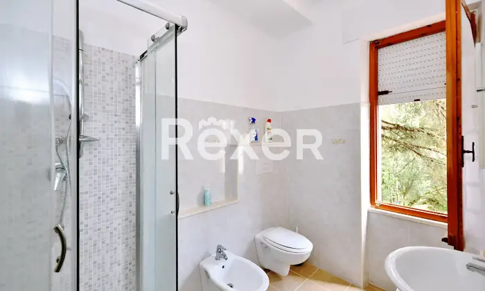 Rexer-Cala-Gonone-Appartamento-con-terrazza-a-livello-e-box-auto-Altro