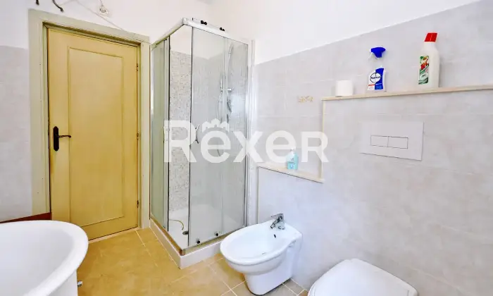 Rexer-Cala-Gonone-Appartamento-con-terrazza-a-livello-e-box-auto-Altro