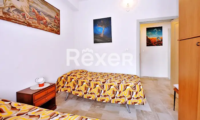 Rexer-Cala-Gonone-Appartamento-con-terrazza-a-livello-e-box-auto-Altro