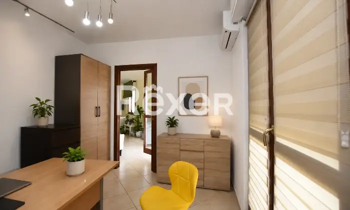 Rexer-Sassari-Appartamento-di-mq-locali-e-doppi-servizi-con-terrazzo-posto-auto-coperto-e-cantina-Cucina