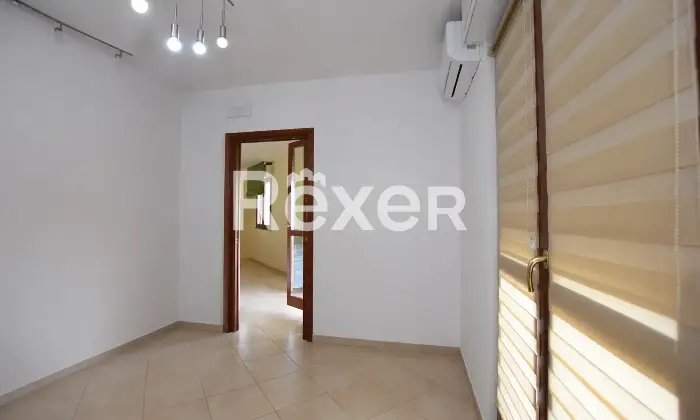 Rexer-Sassari-Appartamento-di-mq-locali-e-doppi-servizi-con-terrazzo-posto-auto-coperto-e-cantina-Cucina