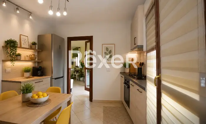 Rexer-Sassari-Appartamento-di-mq-locali-e-doppi-servizi-con-terrazzo-posto-auto-coperto-e-cantina-Cucina