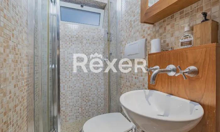 Rexer-Roma-Appartamento-ampio-e-luminoso-con-tripla-esposizione-e-posto-auto-coperto-Altro