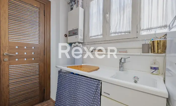 Rexer-Roma-Appartamento-ampio-e-luminoso-con-tripla-esposizione-e-posto-auto-coperto-Altro