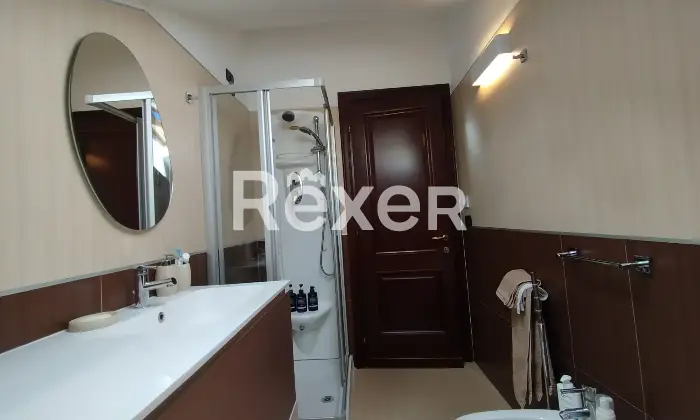 Rexer-LAquila-Elegante-duplex-con-terrazzi-cantina-e-doppi-garage-Altro