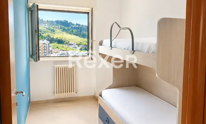 Rexer-Matera-Appartamento-con-ampio-terrazzo-e-splendida-vista-al-penultimo-piano-Altro