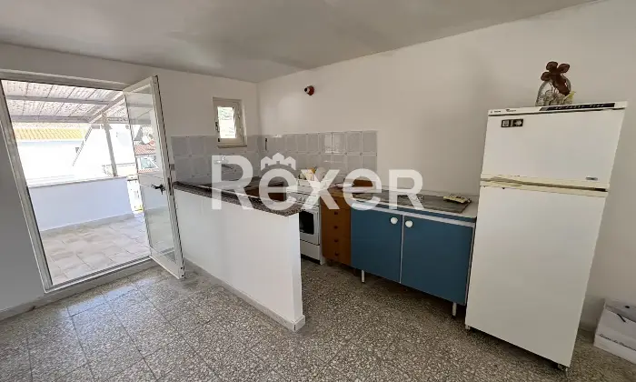 Rexer-Diamante-Ampio-e-panoramico-appartamento-con-sovrastante-terrazzo-da-mq-Cucina