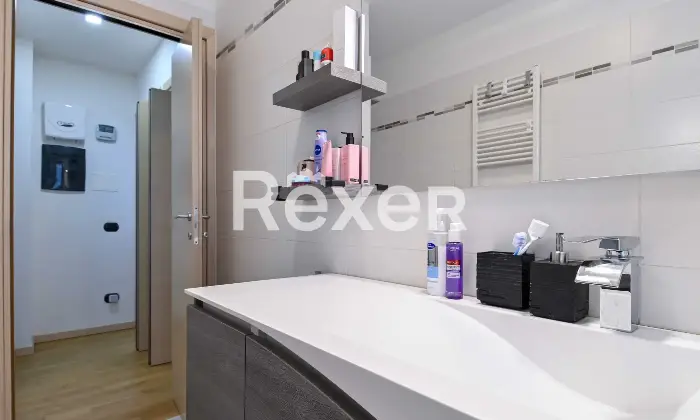 Rexer-osio-sotto-In-Classe-B-Moderno-trilocale-al-piano-terra-con-camino-Altro