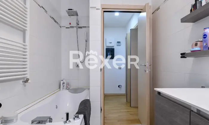 Rexer-osio-sotto-In-Classe-B-Moderno-trilocale-al-piano-terra-con-camino-Altro