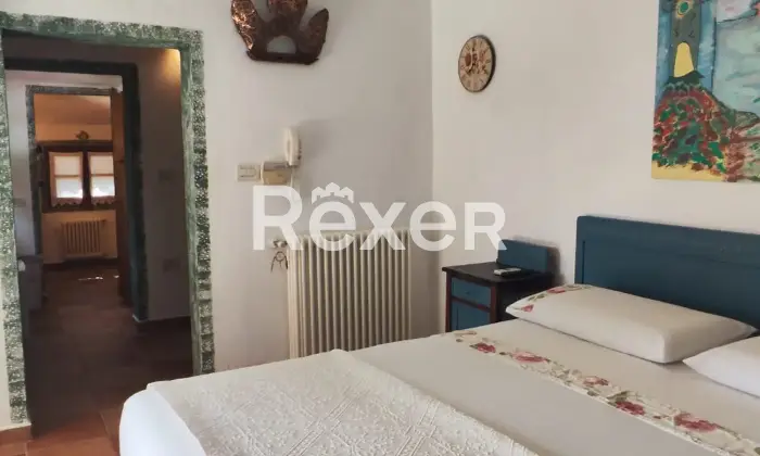 Rexer-Quartu-SantElena-E-S-S-E-N-Z-A-CASA-e-giardino-Camera-da-letto-matrimoniale