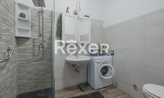 Rexer-Roma-MarconiTrilocale-con-posto-auto-e-cantina-Altro
