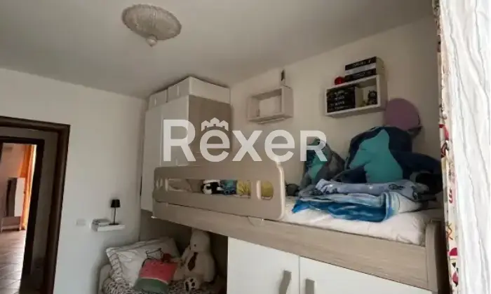 Rexer-Muros-Appartamento-su-due-piani-in-vendita-in-Via-Coghinas-a-Muros-Camera-da-letto